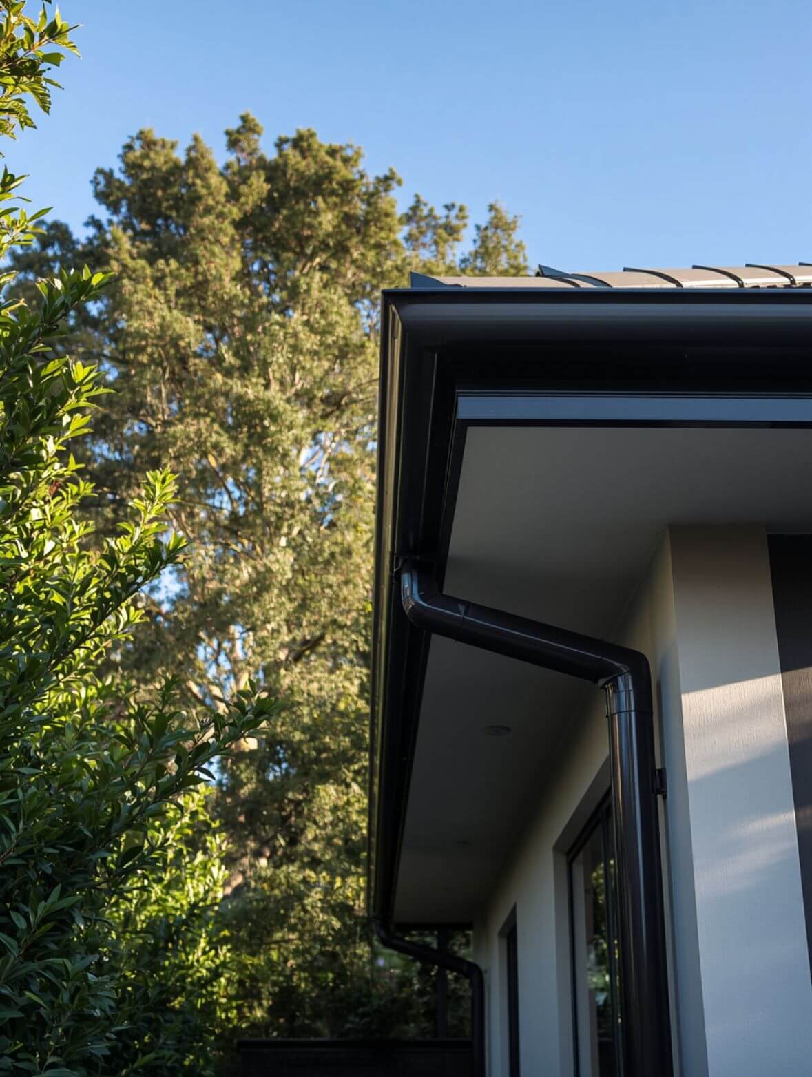 New black gutters on a house
